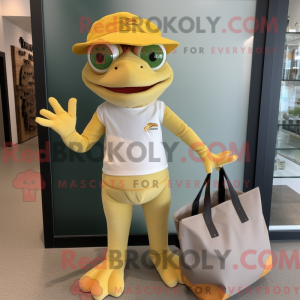 Maskotfigur af en guldgekko...