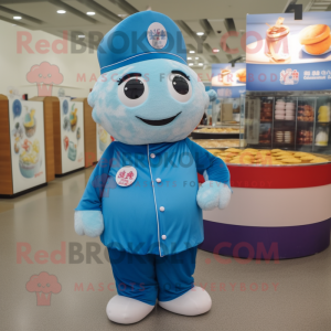 Blue Dim Sum mascot costume character dressed with a Polo Shirt and Brooches