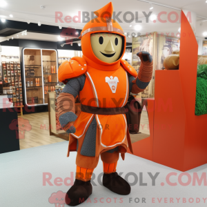 Maskotkarakter af en orange...