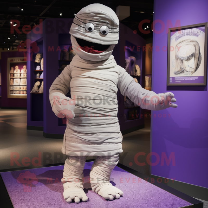 Lavender Mummy mascot costume character dressed with a Button-Up Shirt and Foot pads