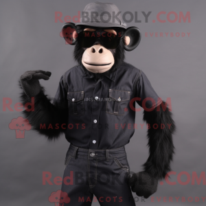 Maskotfigur af en sort abe...