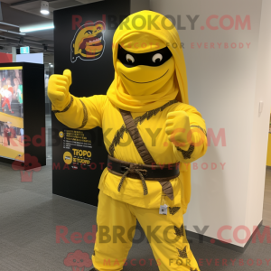 Postava maskota žlutého...