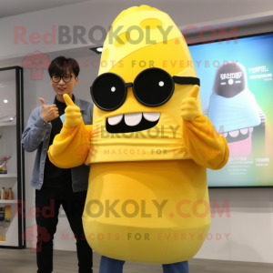 Yellow Sushi mascot costume character dressed with a Boyfriend Jeans and Sunglasses