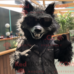 Maskottchen einer schwarzen...