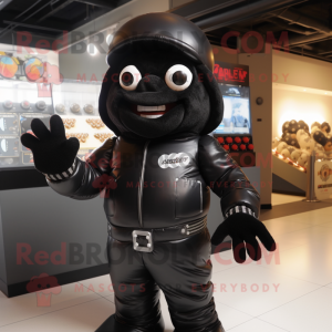 Black Candy Box mascot costume character dressed with a Bomber Jacket and Gloves