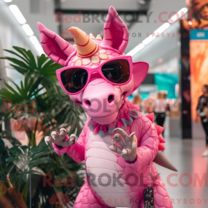 Maskotkarakter af en Pink...
