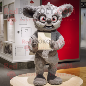 Gray Love Letter mascot costume character dressed with a Romper and Clutch bags