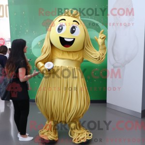 Maskot karakter af en guld...