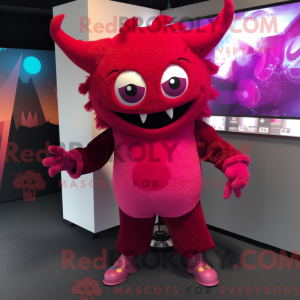 Maskotfigur af en magenta...