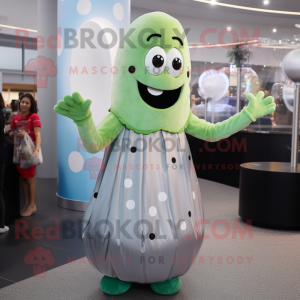 Silver Cucumber mascot costume character dressed with a Maxi Dress and Gloves