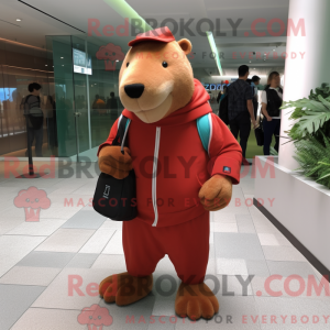 Maskot karakter af en rød...
