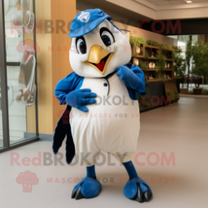 Cream Blue Jay mascot costume character dressed with a Shorts and Wraps