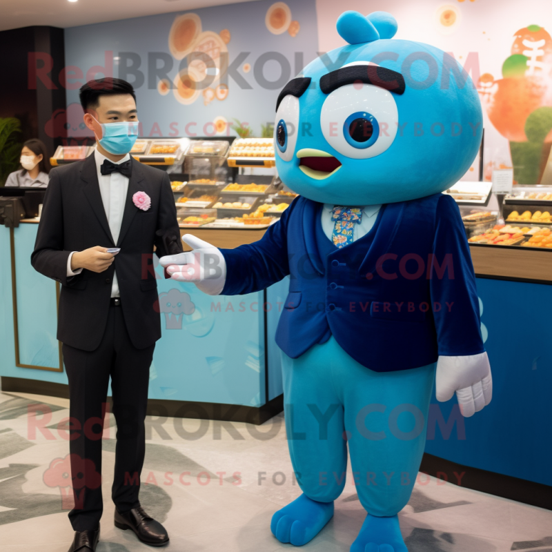 Blue Dim Sum mascot costume character dressed with a Suit Jacket and Watches