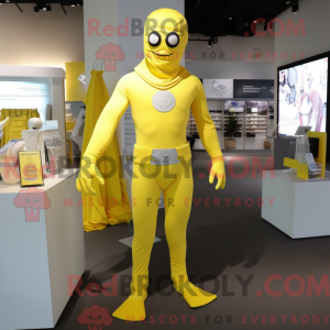 Maskotfigur af en citrongul...