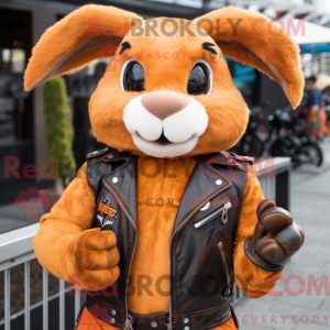 Maskotfigur af en orange...