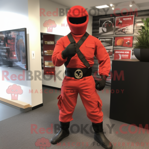 Maskot-karakter av en rød...