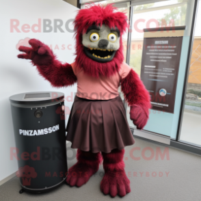 Maroon Frankenstein'S Monster mascot costume character dressed with a Pencil Skirt and Foot pads
