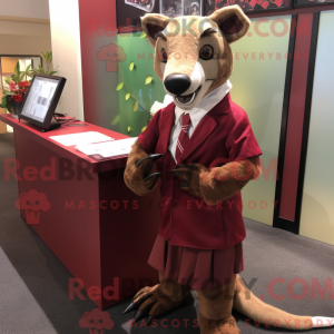 Mascot character of a Maroon Thylacosmilus dressed with a Wrap Skirt and Tie pins