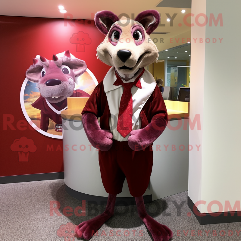 Mascot character of a Maroon Thylacosmilus dressed with a Wrap Skirt and Tie pins