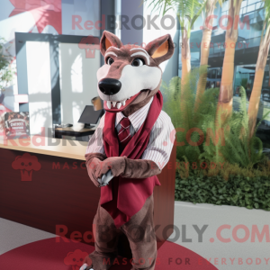 Mascot character of a Maroon Thylacosmilus dressed with a Wrap Skirt and Tie pins