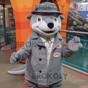 Mascot character of a Gray Salmon dressed with a Coat and Hat pins