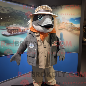 Mascot character of a Gray Salmon dressed with a Coat and Hat pins