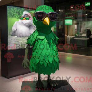 Mascot character of a Green Blackbird dressed with a Empire Waist Dress and Sunglasses