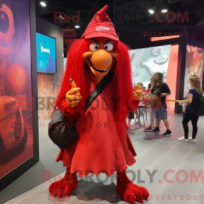 Mascot character of a Red Witch dressed with a Graphic Tee and Backpacks