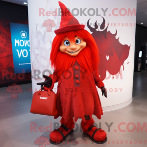 Mascot character of a Red Witch dressed with a Graphic Tee and Backpacks