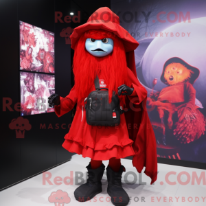 Mascot character of a Red Witch dressed with a Graphic Tee and Backpacks