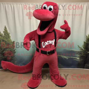 Mascot character of a Red Loch Ness Monster dressed with a Corduroy Pants and Hat pins