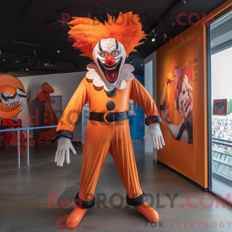 Mascot character of a Orange Evil Clown dressed with a Jeggings and Suspenders