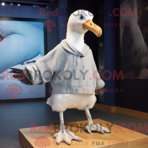 Mascot character of a Albatross dressed with a Sweater and Shoe clips