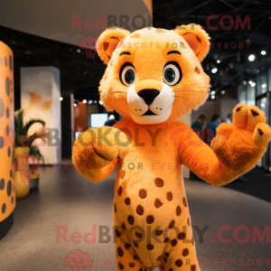 Mascot character of a Orange Cheetah dressed with a Sheath Dress and Mittens