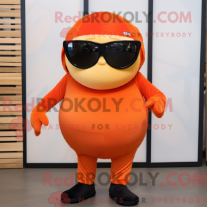 Mascot character of a Orange Shakshuka dressed with a V-Neck Tee and Sunglasses