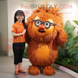 Mascot character of a Orange Porcupine dressed with a Blouse and Eyeglasses