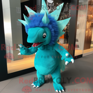 Mascot character of a Cyan Stegosaurus dressed with a Long Sleeve Tee and Brooches