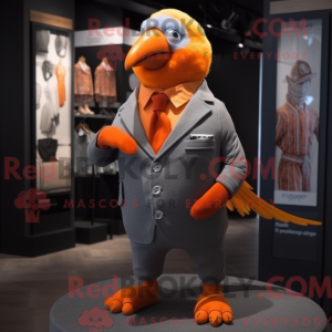 Mascot character of a Orange Pigeon dressed with a Suit and Scarf clips