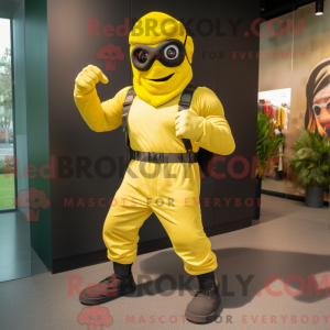 Mascot character of a Yellow Commando dressed with a Joggers and Rings