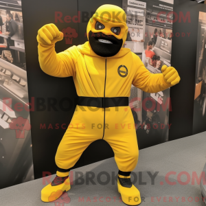 Mascot character of a Yellow Commando dressed with a Joggers and Rings