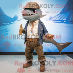 Mascot character of a Brown Swordfish dressed with a Boyfriend Jeans and Hat pins