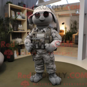 Mascot character of a Gray Special Air Service dressed with a Sweater and Ties