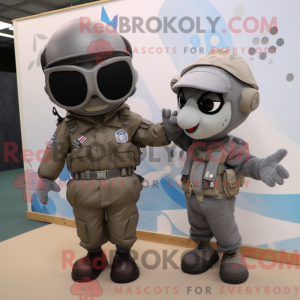 Mascot character of a Gray Special Air Service dressed with a Sweater and Ties