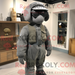 Mascot character of a Gray Special Air Service dressed with a Sweater and Ties