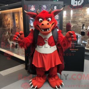 Mascot character of a Red Gargoyle dressed with a Empire Waist Dress and Backpacks