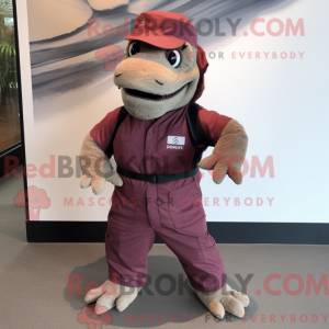 Mascot character of a Maroon Komodo Dragon dressed with a Cargo Pants and Keychains