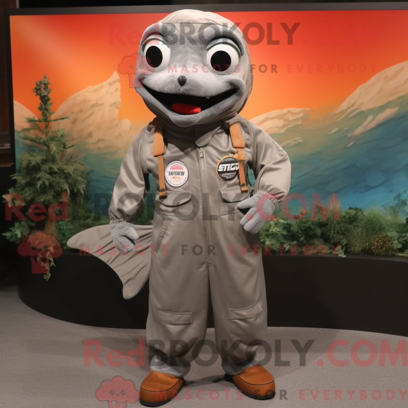Mascot character of a Silver Salmon dressed with a Overalls and Shoe laces