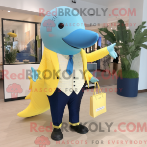 Mascot character of a Lemon Yellow Blue Whale dressed with a Waistcoat and Clutch bags