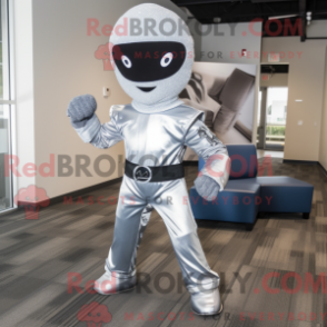 Mascot character of a Silver Ninja dressed with a Flare Jeans and Ties