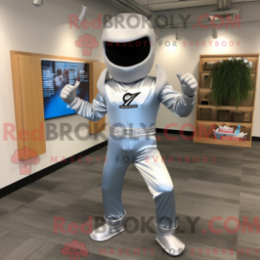 Mascot character of a Silver Ninja dressed with a Flare Jeans and Ties